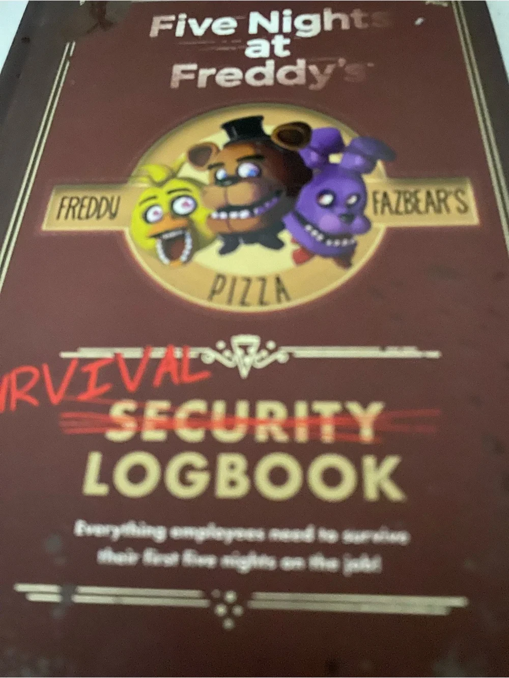 Scholastic Five Nights at Freddy's Brown and Purple Character Logbook